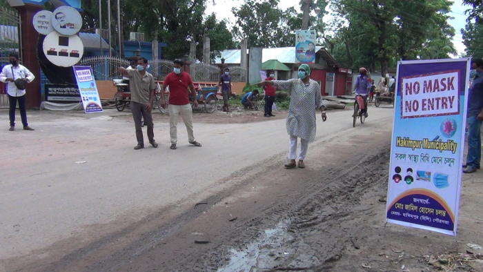 হিলিতে করোনা ভাইরাসের সংক্রামন রোধে নো মাস্ক নো এন্ট্রি কর্মসূচী চালু